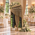 Sticker plan de table mariage personnalisé en lettrage blanc sur miroir doré fleuri, exemple Laetitia et Adam avec neuf tables.